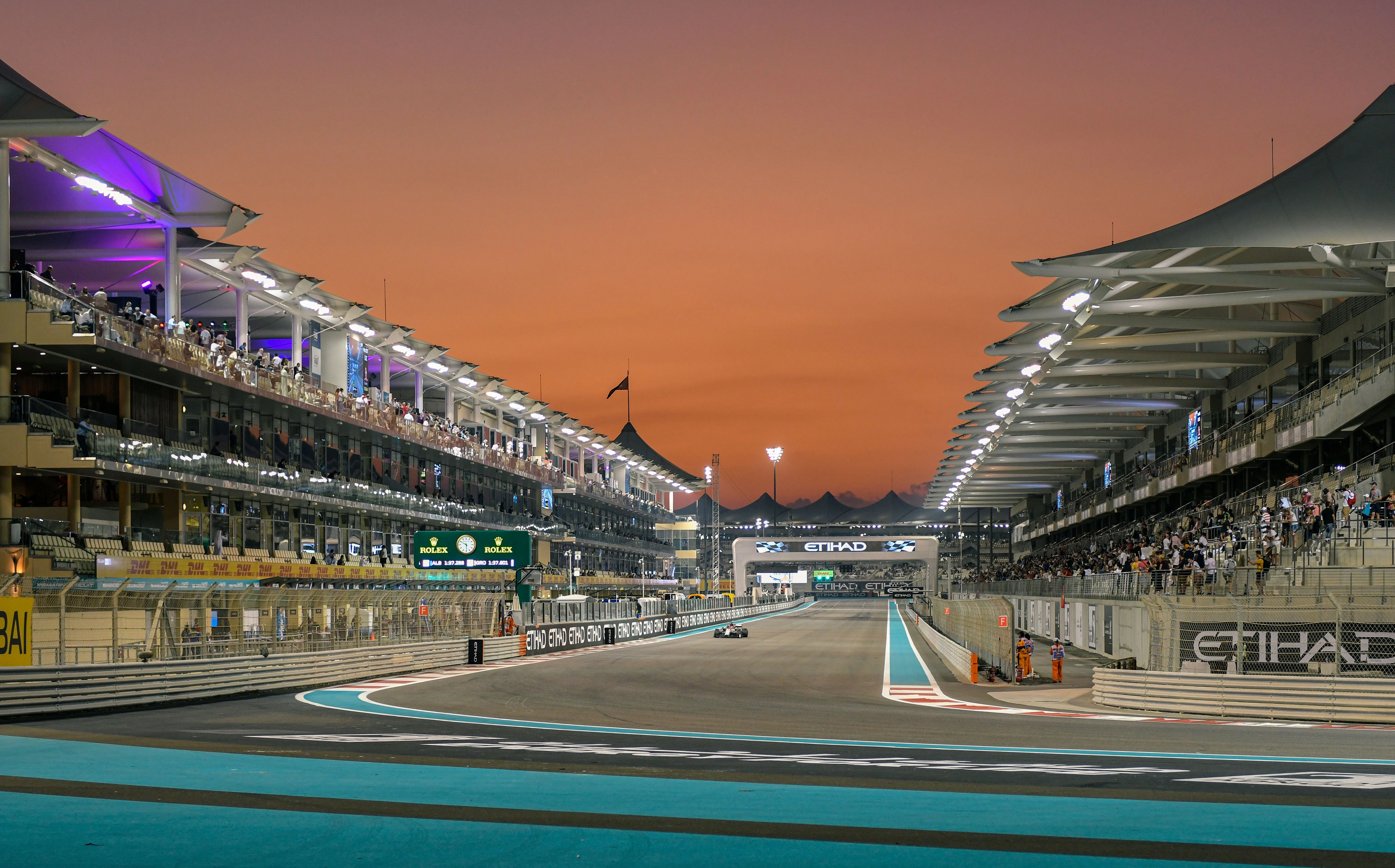 The Yas Marina Circuit under a sunset sky.